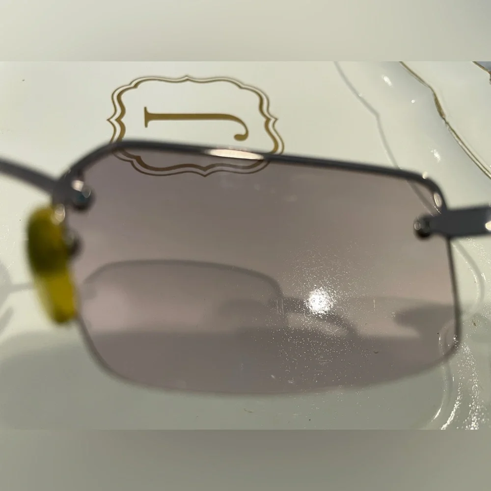 Coach Gold and Gray Sunglasses Rimless Design